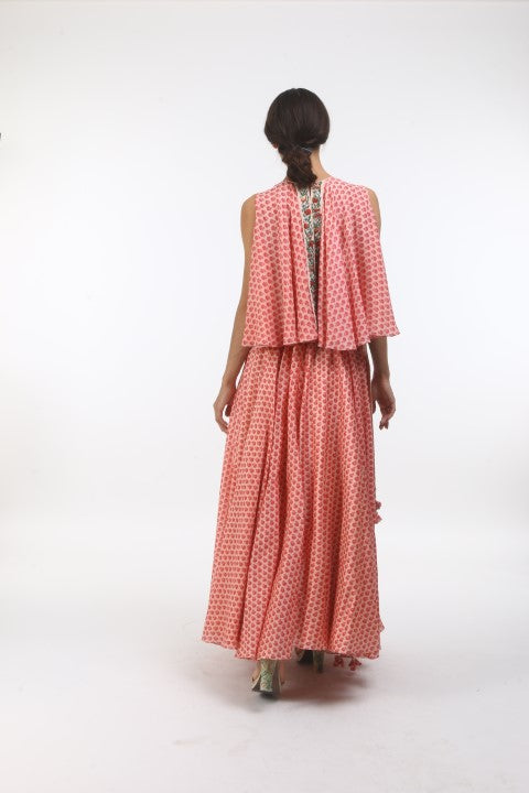 Bloom salmon pink poppy printed chanderi wrap skirt with flared back open top in layered coin embroidered neckline.