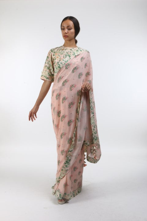Bloom salmon pink hibiscus printed & embellished georgette saree with bibi jaal printed and organza embroidered chanderi blouse.