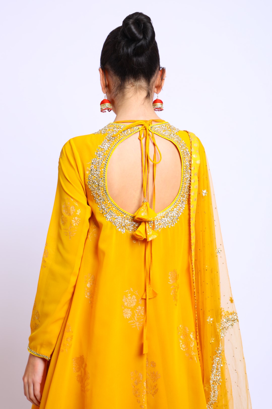 Haldi Yellow Asymmetrical Georgette Emb Kurta paired with Skirt & Dupatta