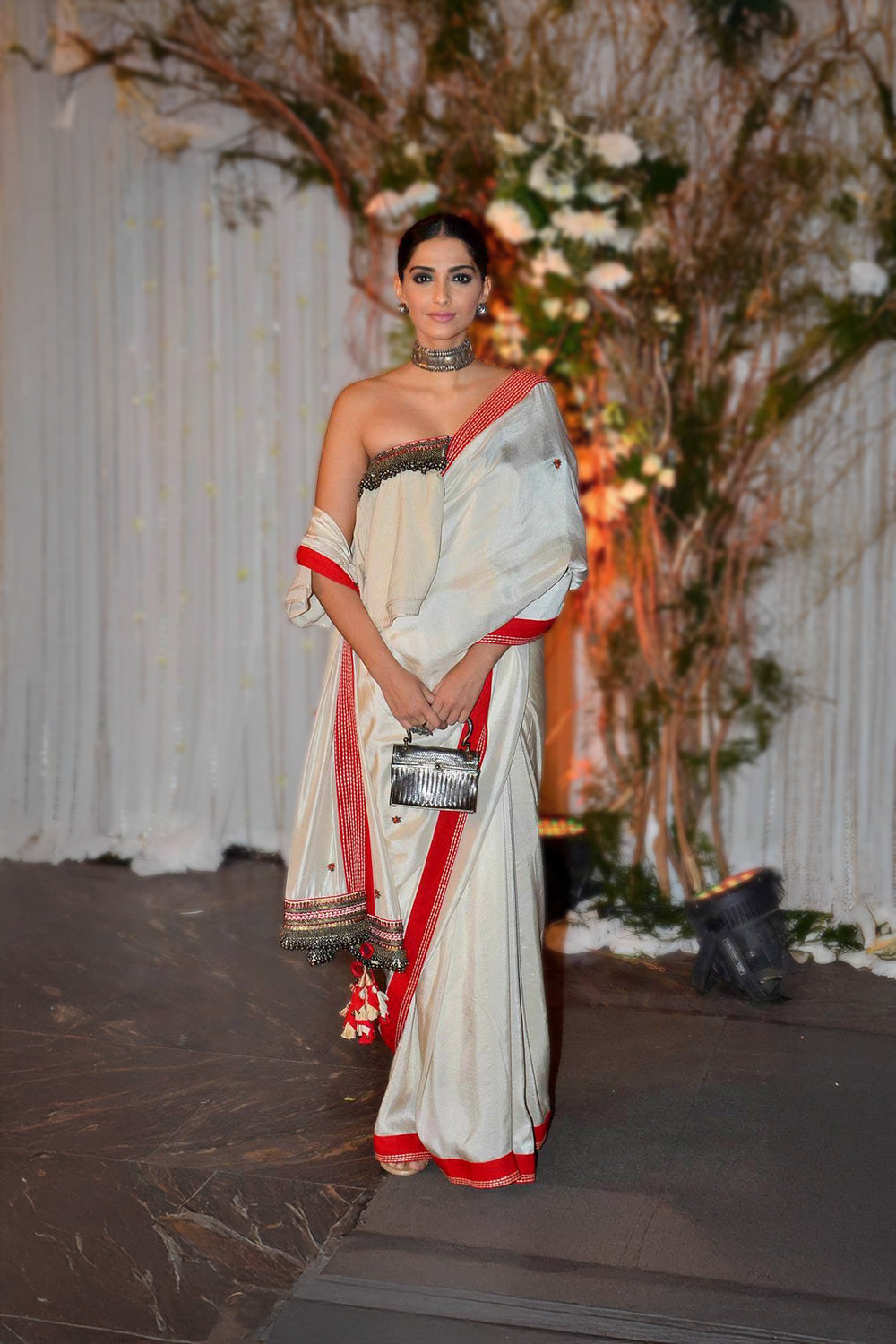 Sonam Kapoor in Ivory Crepe Silk Saree with Ruffled Off-Shoulder Blouse