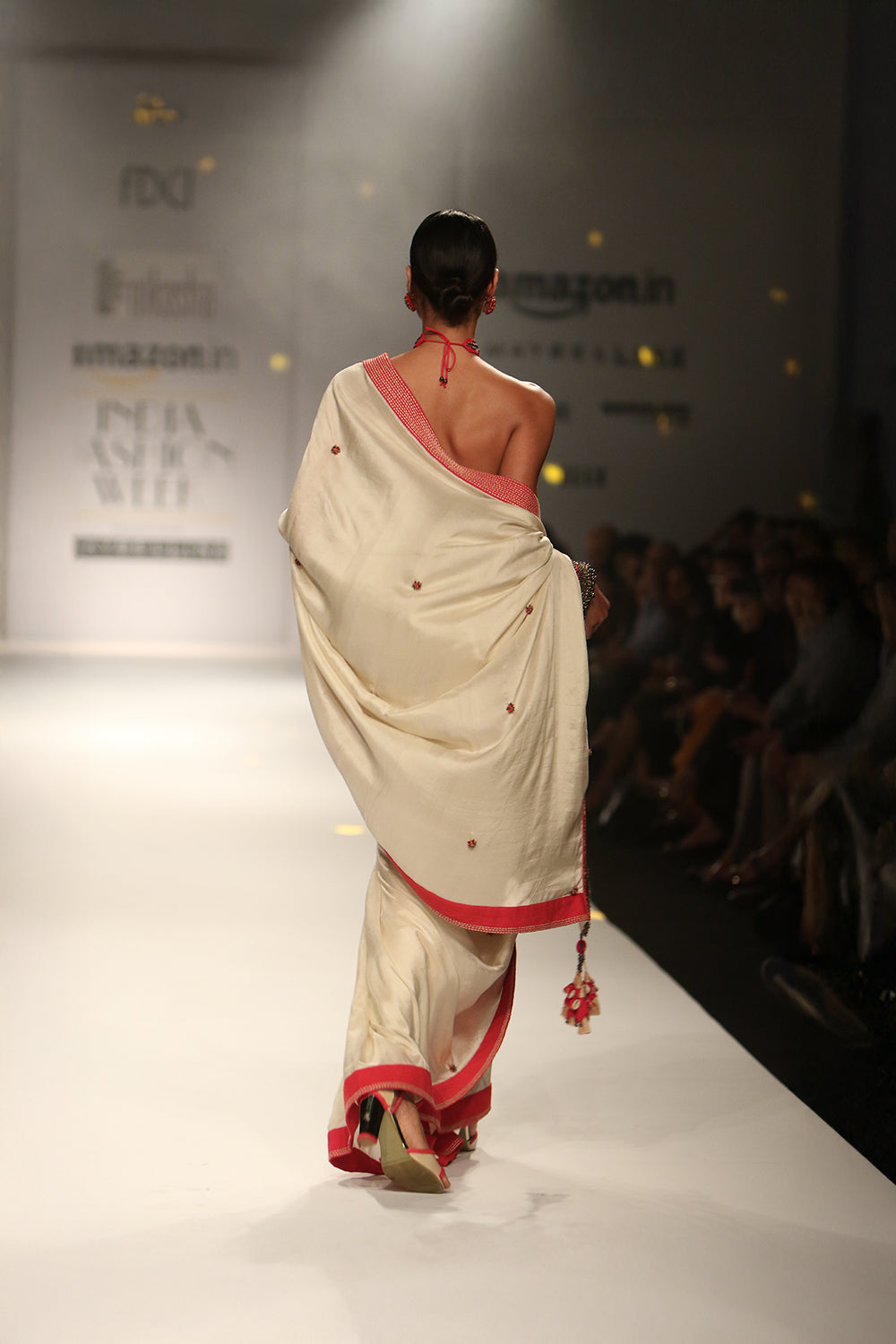Sonam Kapoor in Ivory Crepe Silk Saree with Ruffled Off-Shoulder Blouse