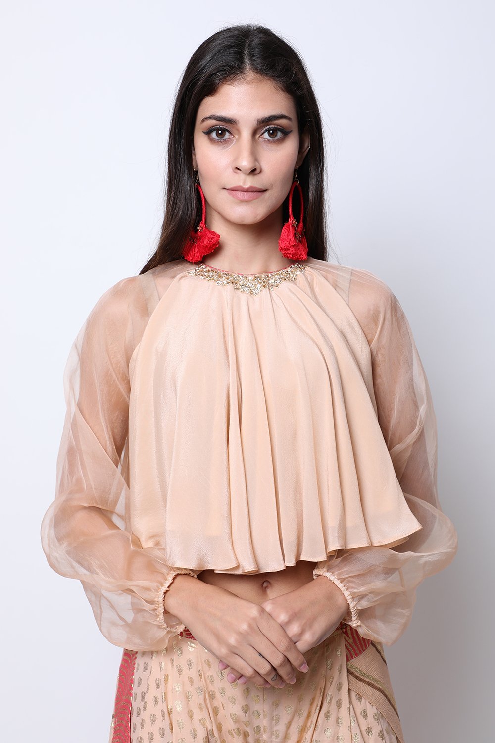 Light Tabacco embroidered blouse , paired with cowl dhoti attached leheriya palla.