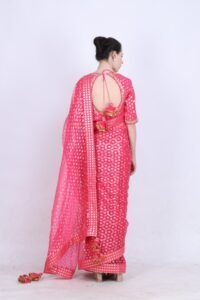 Crepe hot pink printed organza saree with a gold foil printed blouse